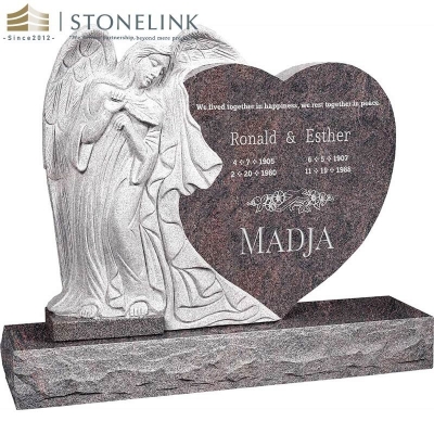 Leaning angel heart-shaped granite headstone