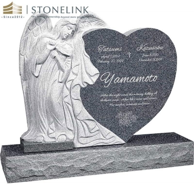 Leaning angel heart-shaped granite headstone